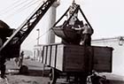 Unloading coal into wagon at Harbour c1950 [Chris Brown]